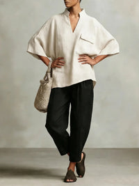 Elegant poncho top and tapered trousers linen two piece set